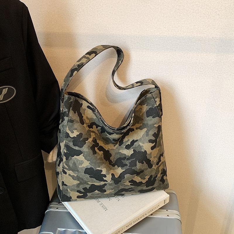 Casual large-capacity leopard print bag women's 2025 new commuter versatile shoulder bag slack tote bag bucket bag