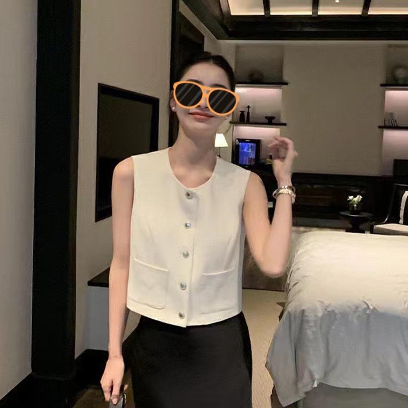 Dames fransk rund hals enkeltspent dobbel lomme ermeløs avslappet strikket vest