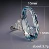 Fashionable Oval Blue Zircon Ring with Large Grain Design in Alloy