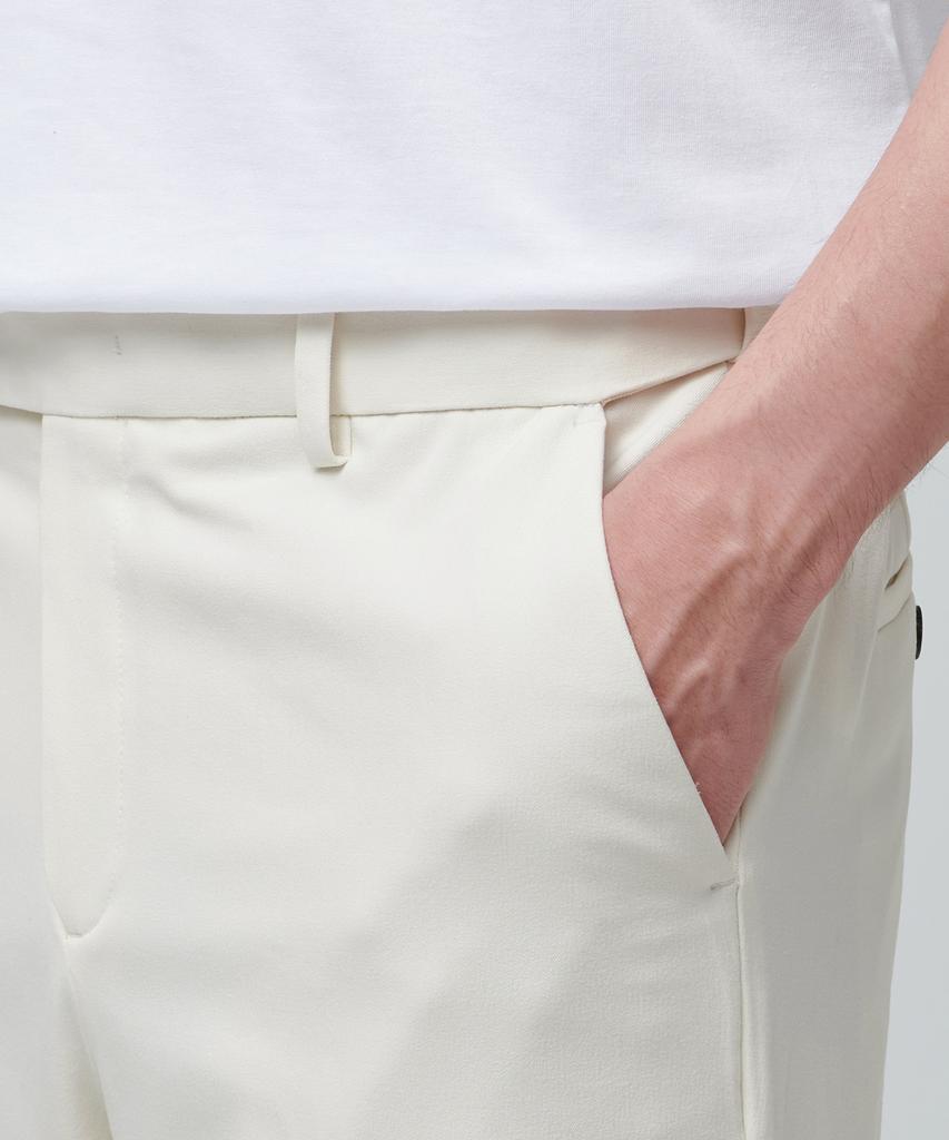 MUSINSA STANDARD Relaxed Tapered Hidden Banding Crop Slacks [Cream]