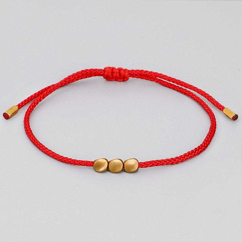 Hand-Woven Red and Black String Bracelet with Irregular Copper Beads