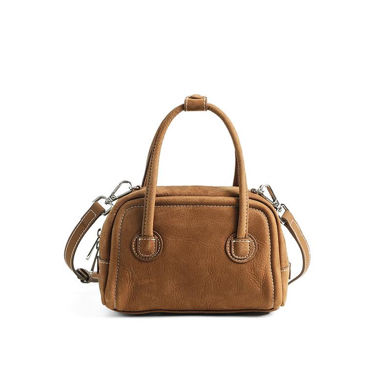 

New niche leather portable small square bag, first layer cowhide high-end messenger bowling pillow bag female кавовий