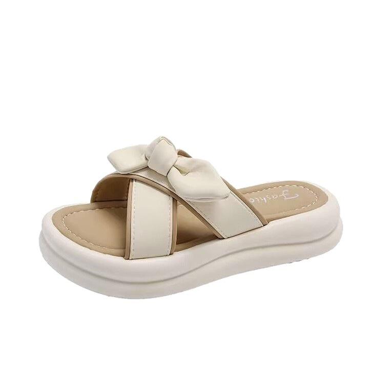 Hausschuhe Sommerkleidung Neujahr neuer Feen-Stil Schleife Muffin-Plateau Strandschuhe Ein-Riemen-Schlappe Ins-Tide