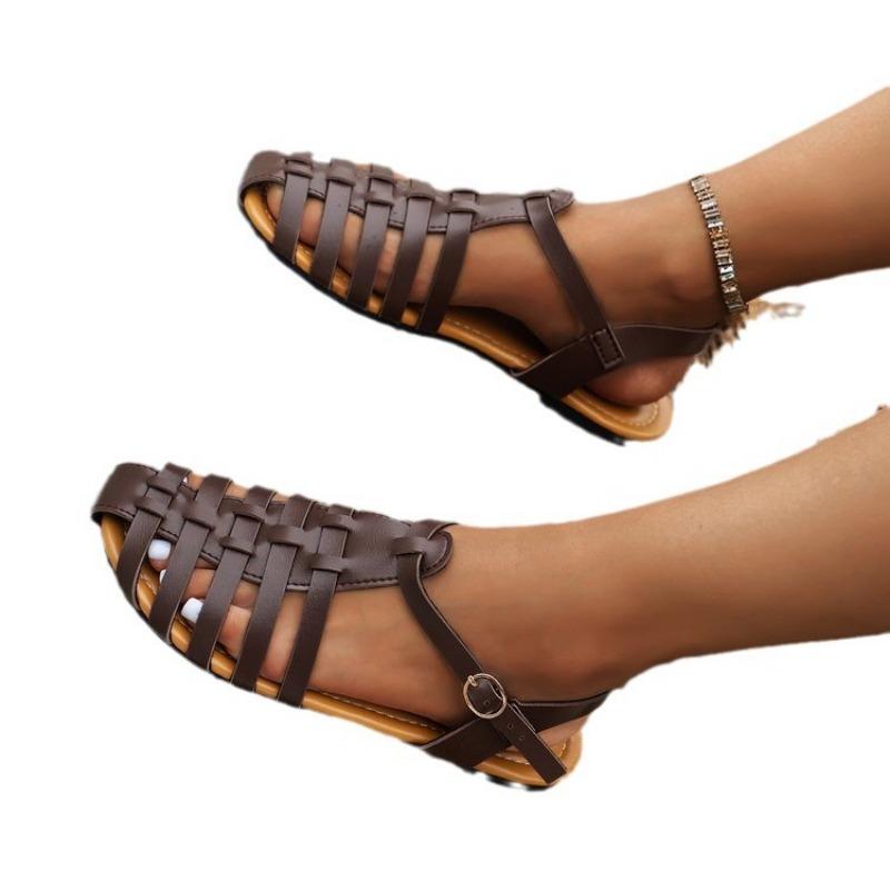 Baotou sandals women's summer new flat-bottomed buckle fashionable large-size beach sandals women