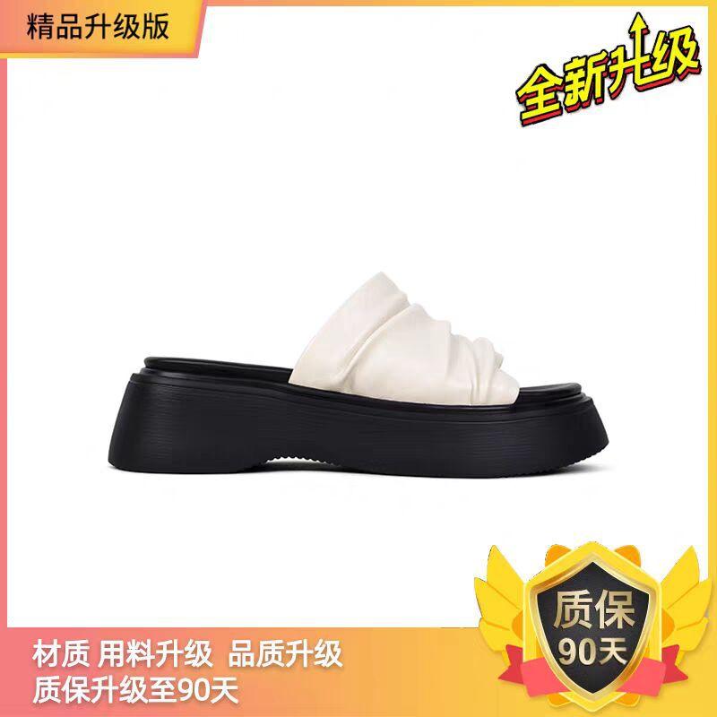 

Thick-soled heightened wrinkled leather one-word slippers women s summer wear 2025 new models with skirts, muffin soles, sandals 40