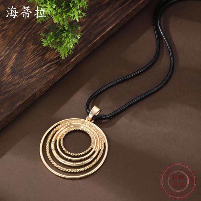 New dumb gold hollow disc leather rope long pendant, women's creative exaggerated geometric ring long necklace