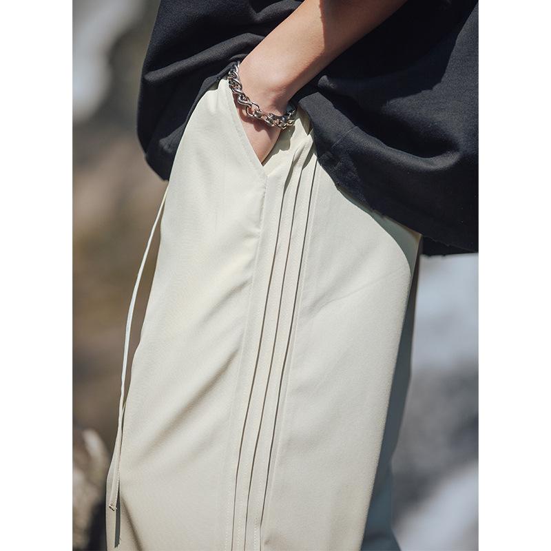 Cool ice silk breathable casual pants men's summer new loose slightly wide sports pants solid color overalls q