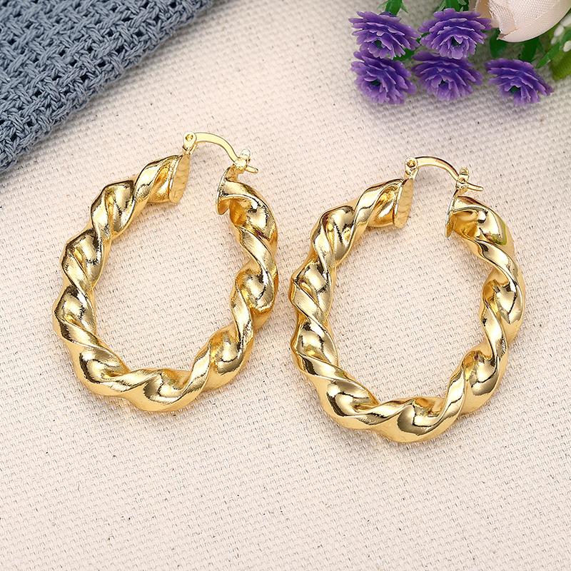 

Huitan Chunky Gold Color Twisted Hoop Earrings for Women Fashion Braided Thick Oval Circle Earrings Statement Hip Hop Zircon