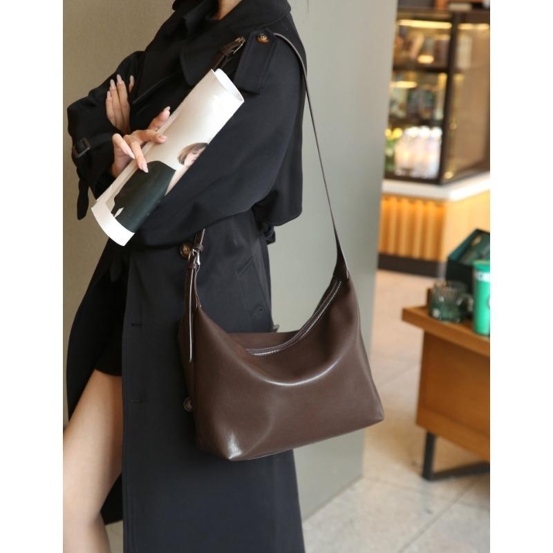 

Сумка-седло подмышку из коровьей кожи растительного дубления, нишевая, женская, универсальная, повседневная, на одно плечо, для поездок на работу, сумка-пельмень из натуральной кожи, ощущение высокого класса