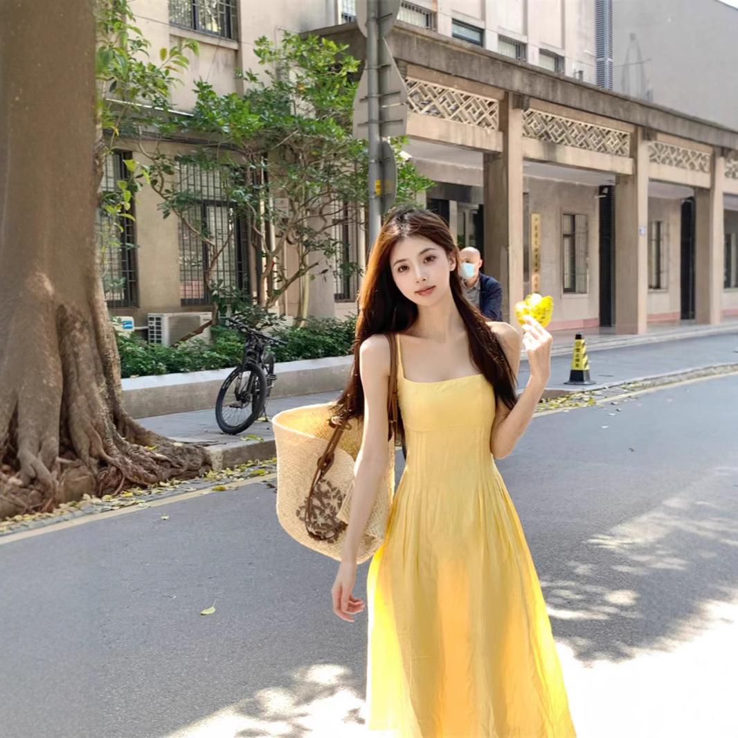 

Seaside vacation travel Thailand super beautiful yellow suspender dress women s summer gentle wind waist French long skirt 2XL жовтий