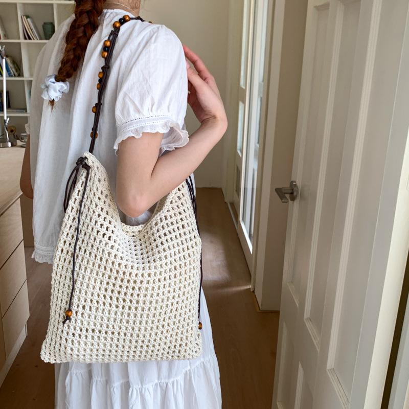 Hollow Woven Fashionable Large-capacity Bucket Bag Women's Summer New Holiday Wind Beach Straw Shoulder Bag