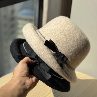 New Qianjin Style Gray Bow Curled Woolen Fisherman Hat for Women In Autumn and Winter Face Showing Small Top Hat Temperament Basin Hat