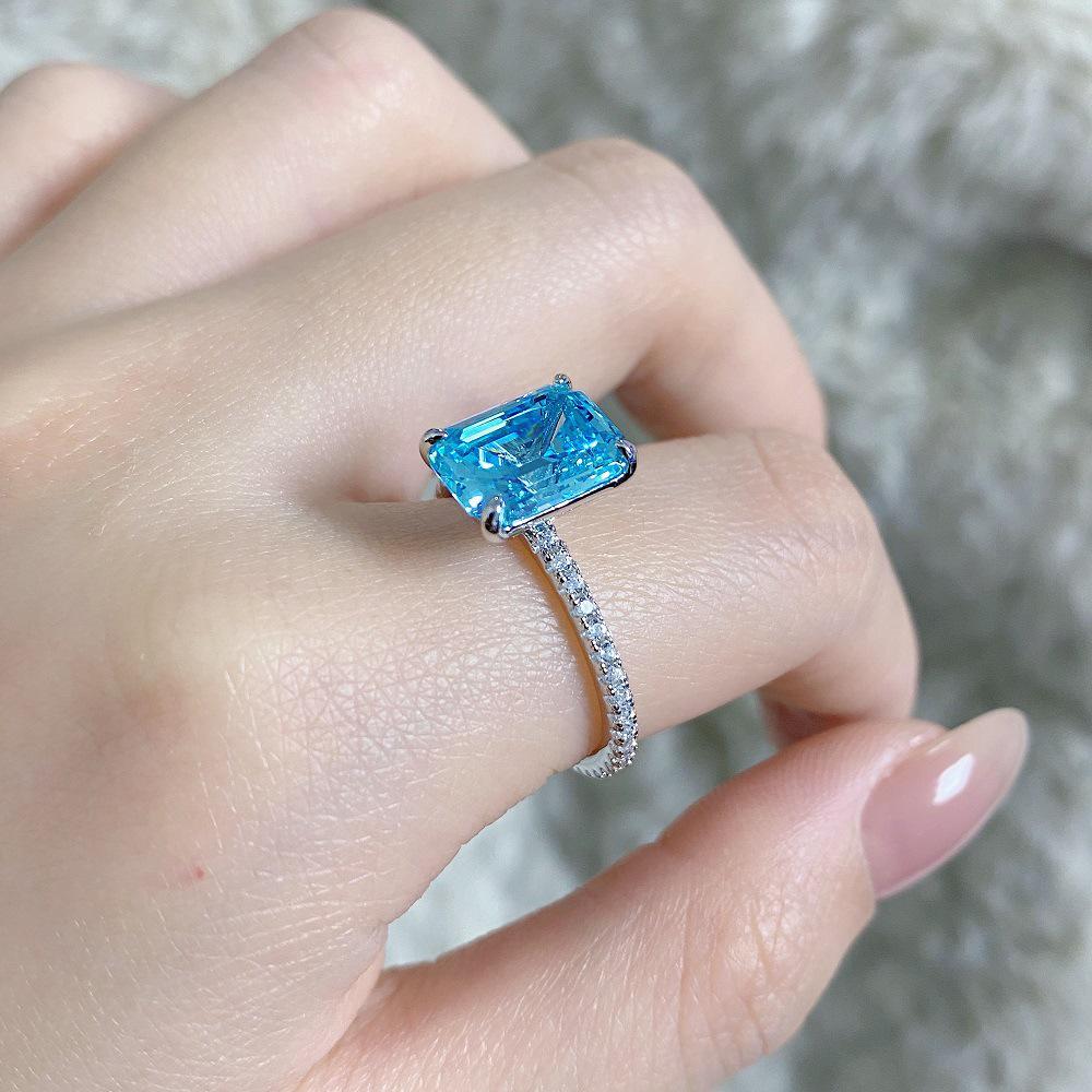 Aquamarine Emerald-Cut Ring In 925 Sterling Silver with Pave Diamonds, Plated In PT950 Gold.
