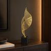 Gold-Tone Metal Sculpture with Black Marble Base Modern Sculptural Accent