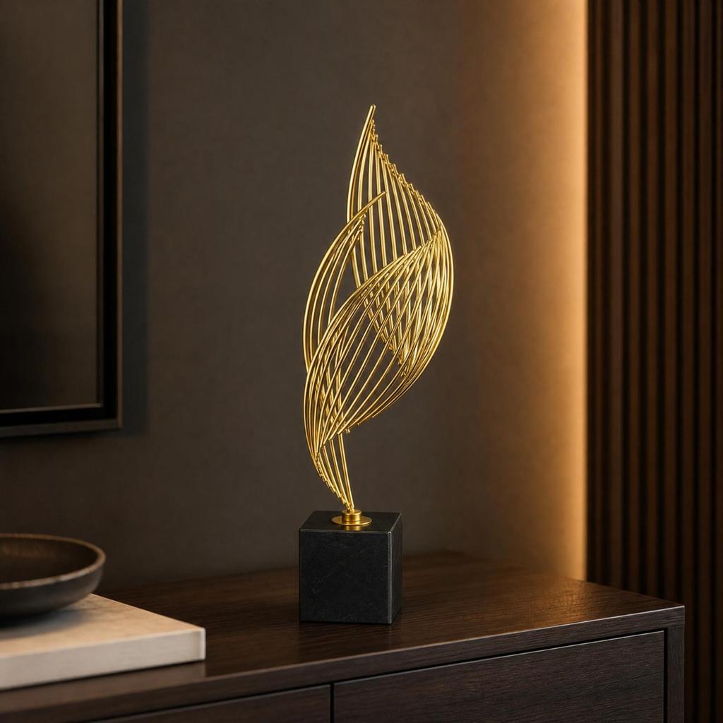Gold-Tone Metal Sculpture with Black Marble Base Modern Sculptural Accent