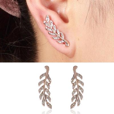 European Fashion Silver Needle Leaf Stud Earrings with Symmetrical Hollow Design and Modern Elegance