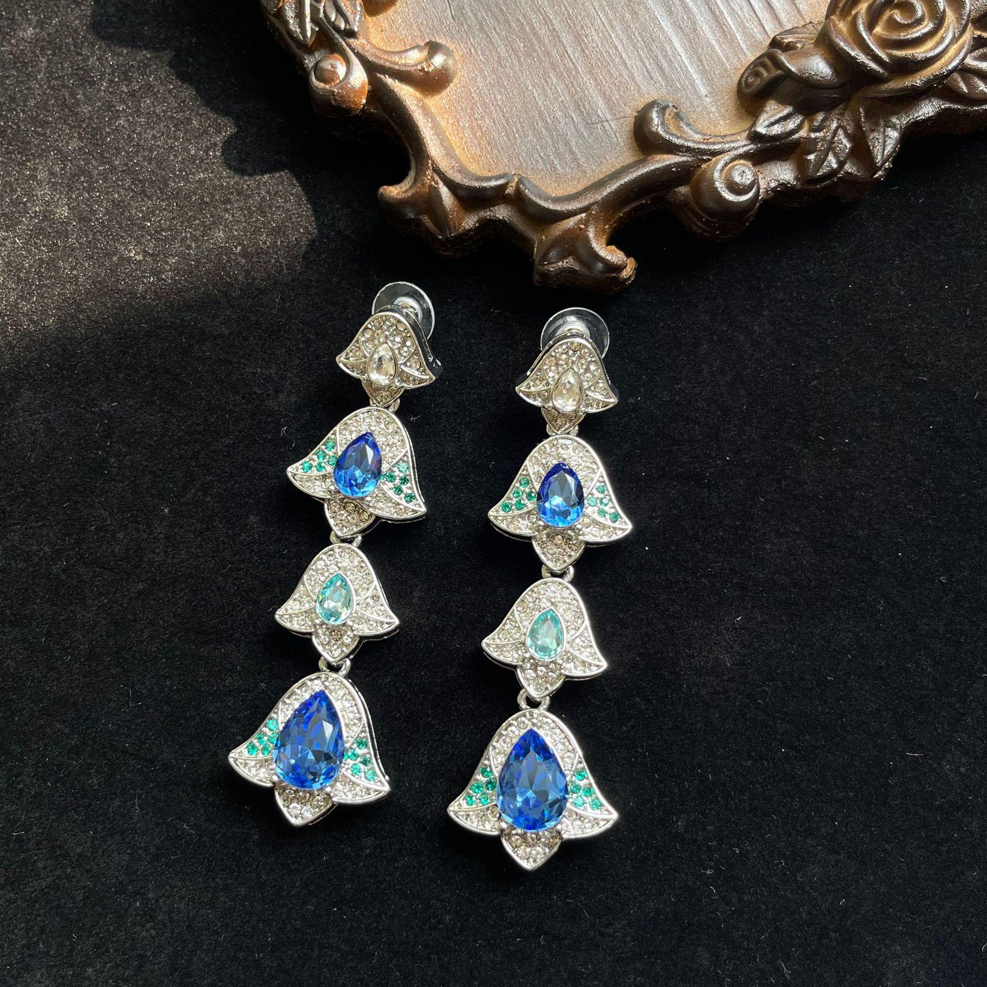 

Vintage Blue Gemstone Drop Earrings with Off-Shoulder Design