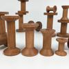 Retro Solid Wood Spool: Nostalgic Handmade Thread Organizer for Cross-Stitch and Crafting.