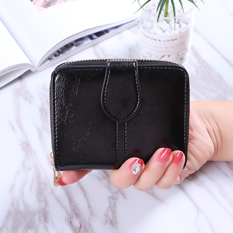2024 Women's Retro Versatile Oil Wax Leather Coin Wallet