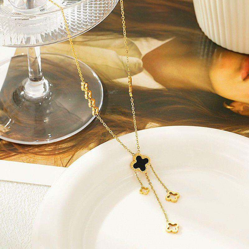 

Роскошное ожерелье из титановой стали с кисточкой и клевером