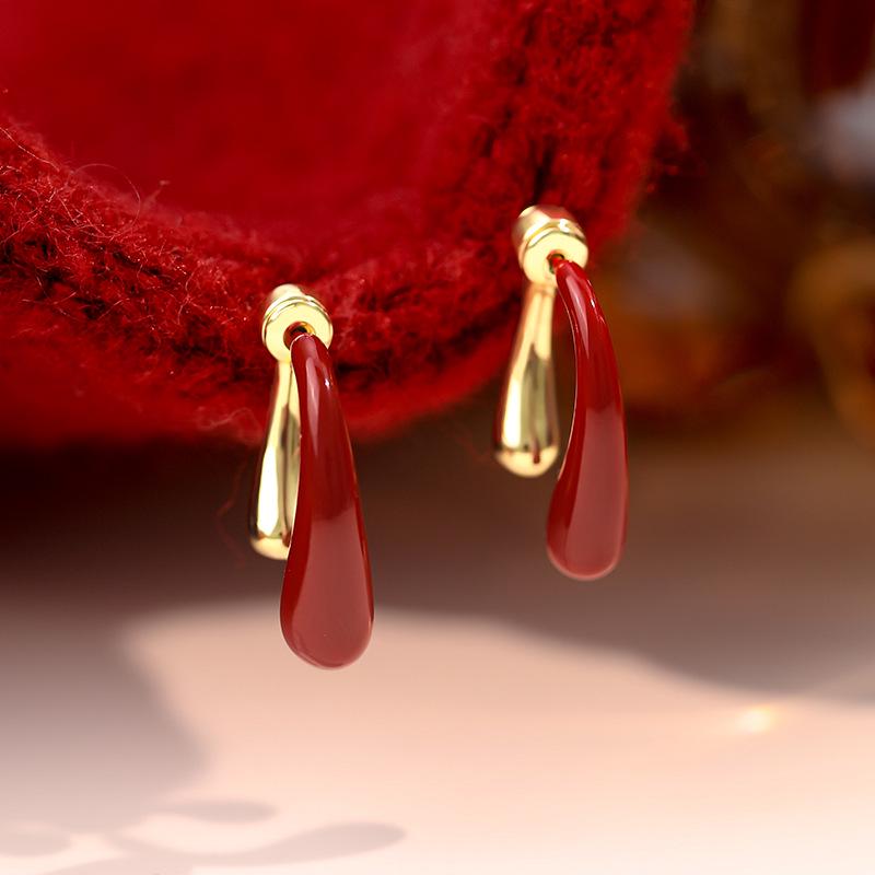 Czerwone Kolczyki Sztyfty z Glazurą Drip na Rok 2025: Styl Luksusowy i Elegancki
