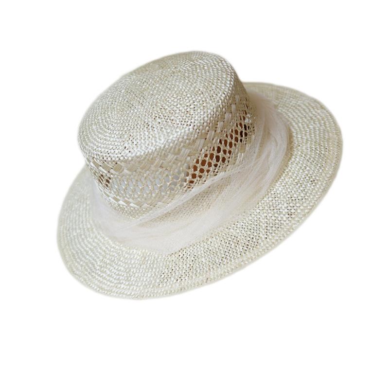 French Elegant Japanese Sisal Grass Woven Flat Top Top Top Hat Women'S Summer Sunshade Sunscreen Hollowed Out Holiday Beach Straw Hat