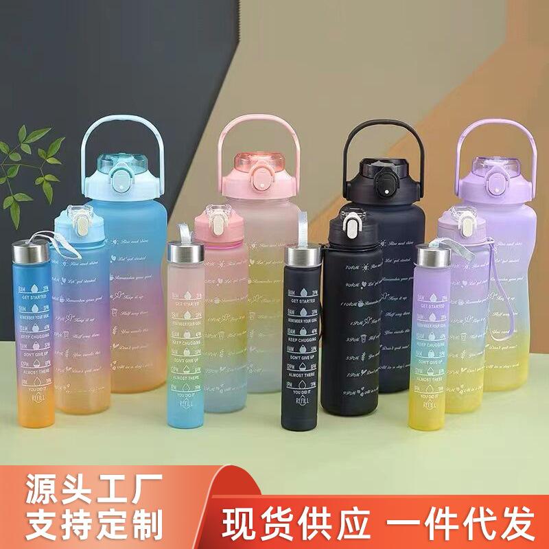 Water bottle gradual change color large capacity straw sports water cup portable handle three-piece fitness plastic cup gift