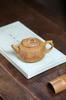 Hexagonal Sea View Yixing Zisha Teapot with Dragon Bone Gold Sand 