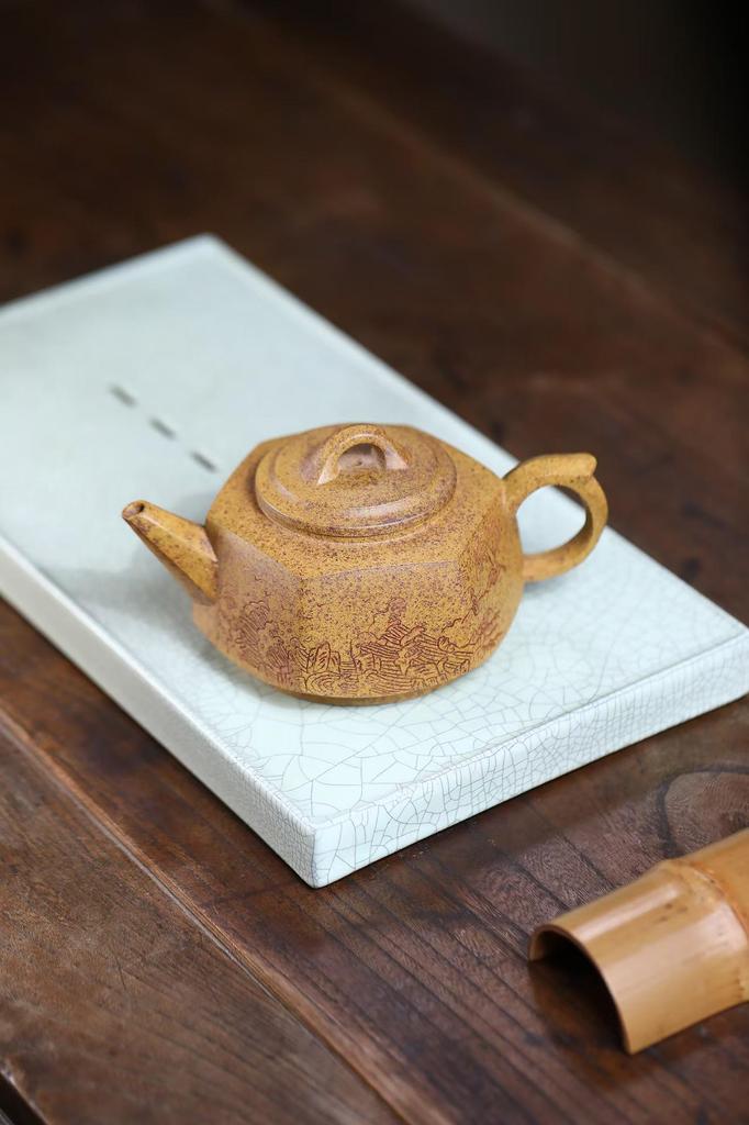 Hexagonal Sea View Yixing Zisha Teapot with Dragon Bone Gold Sand