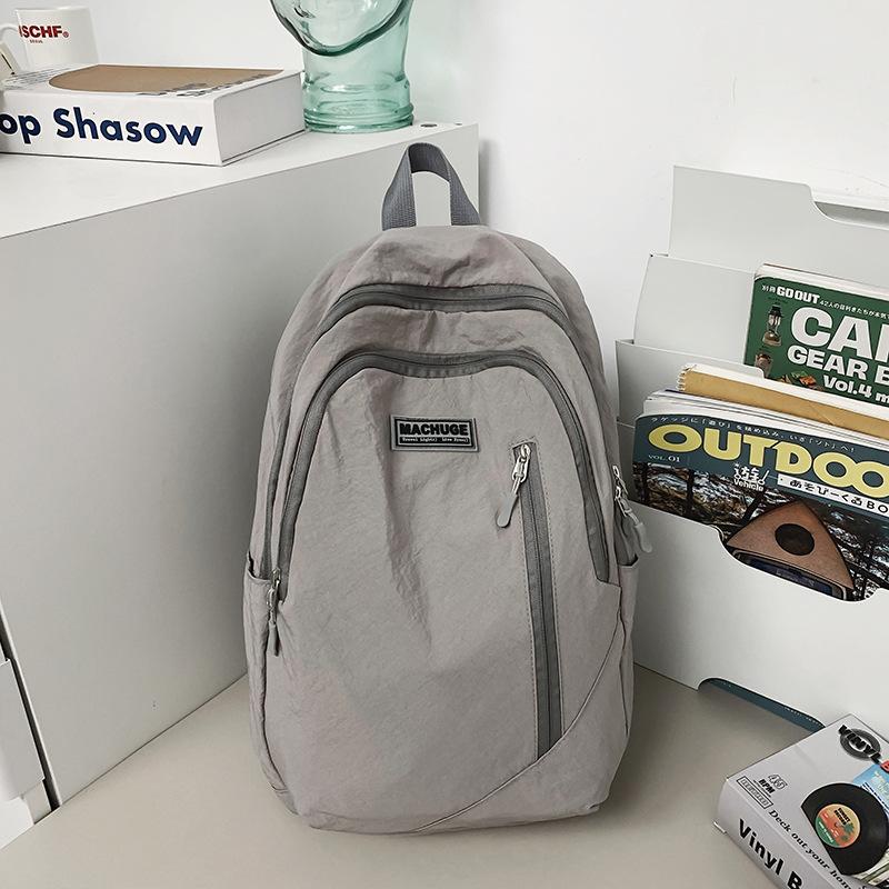 Schoolbag Japanese Simple Casual Backpack Women's Large Capacity Travel Backpack Versatile Student Light Commuter Bag Men's School Bag Tide