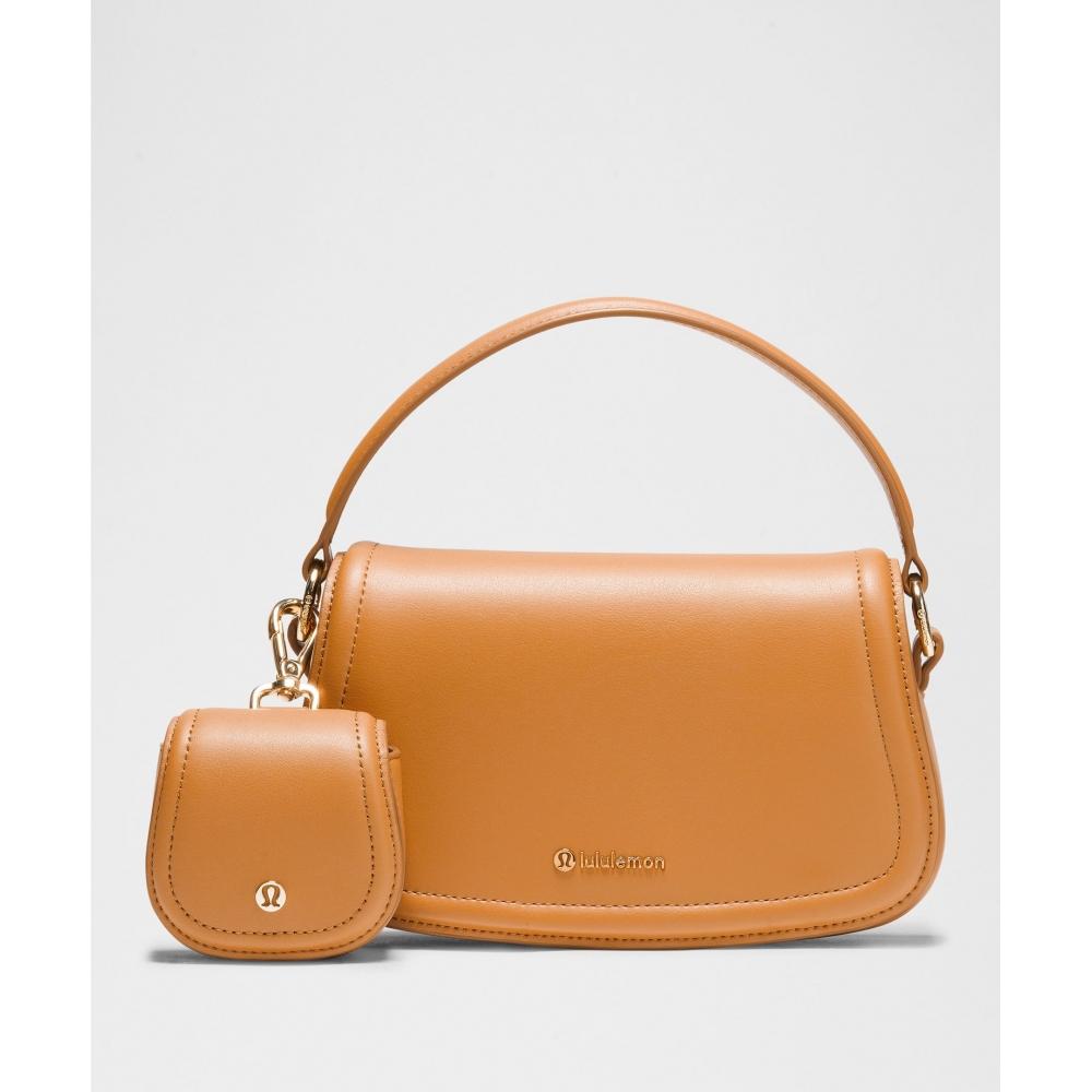 

Lululemon Leather Alternative Mini Bag 1.2l Chestnut Brown Gold ONE SIZE