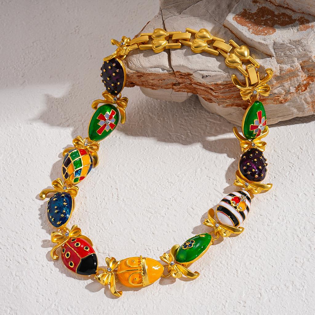 Collana a goccia d'olio a contrasto con diamanti, fiocco a forma di goccia d'acqua, personalità unica, temperamento e senso della gioielleria