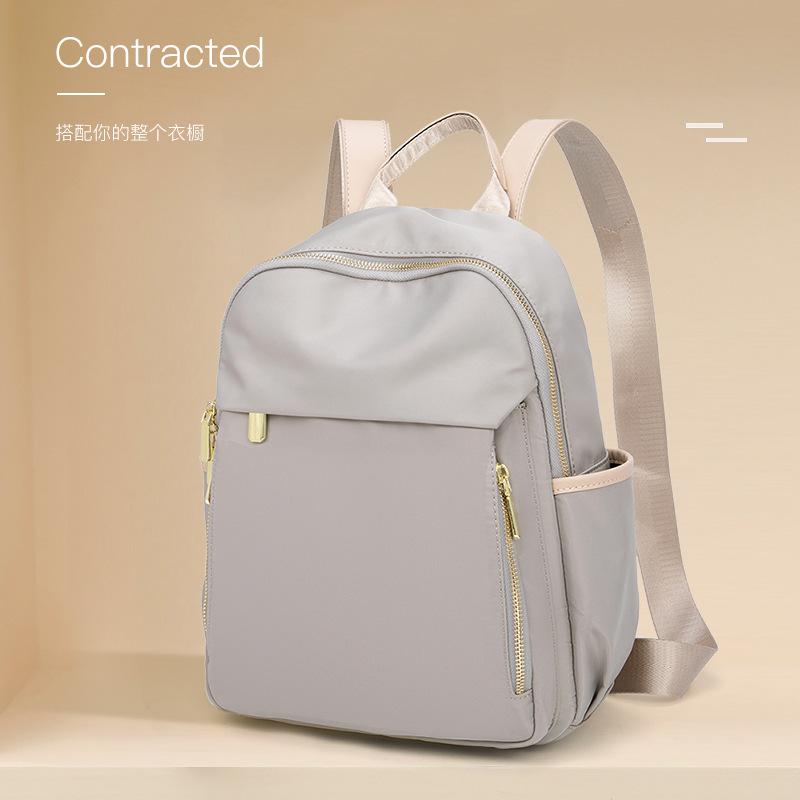 2026 New Arrival Simple Versatile Large Capacity Oxford Cloth Backpack for Women Lightweight Travel Daypack Commuter