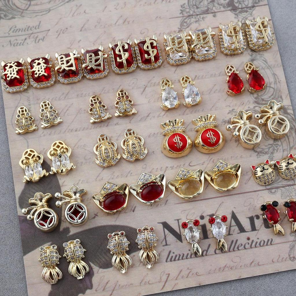 Festive Chinese Style Manicure: Lucky Bag Zirconia Ornaments with Golden Toad, Yuanbao, and Money Character Press-on Nails