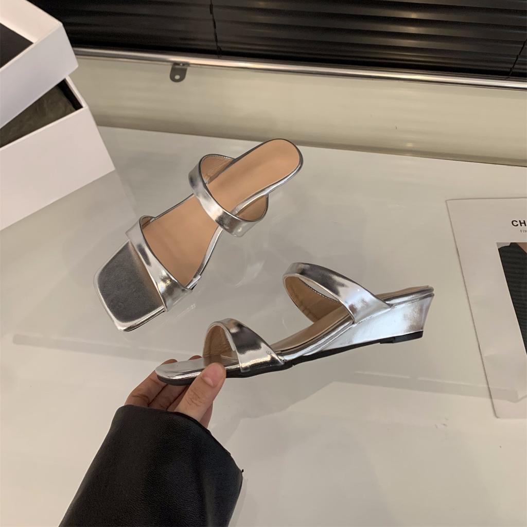 Slope heel simple and versatile one-word slippers women's shoes wear 2025 new summer skirt French sandals