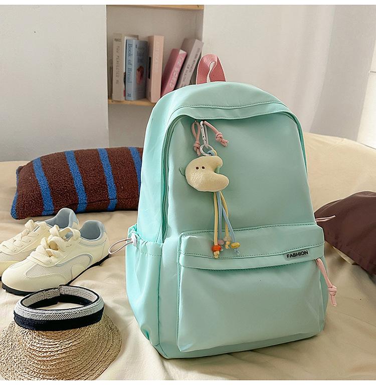 Schoolbag Korean version ins Solid color simple schoolbag Lazy wind backpack Female junior and high school students lightweight large-capacity 