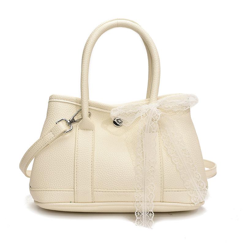 Korean fashion simple casual style portable bucket bag femininity high sense commuting versatile solid color messenger bag