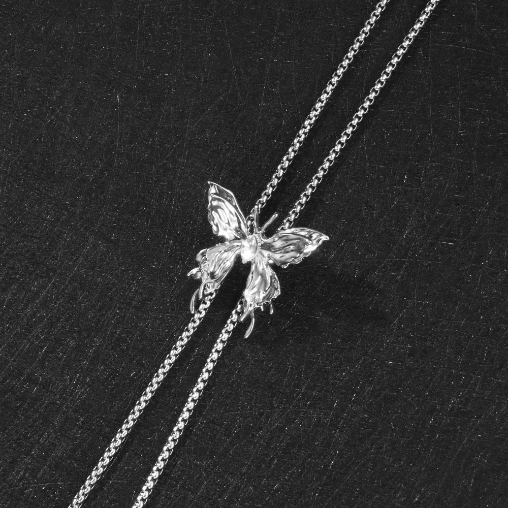 lady's pull-out necklace with a metal butterfly is a fashionable and unique long-chain clothing accessory
