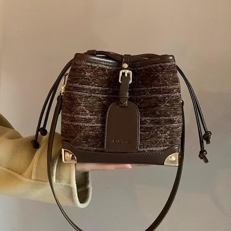 

Nanfeng autumn and winter fashion New York neon bucket bag women s 2025 new retro gilt texture shoulder messenger bag