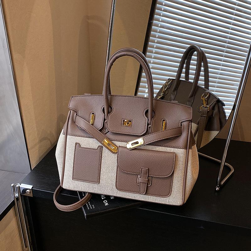 

Large capacity bag women s autumn and winter versatile 2025 new retro messenger bag casual portable commuter tote big bag