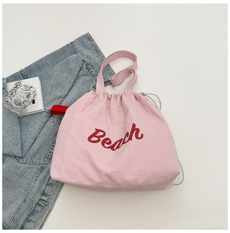 Spring and summer new fashionable large-capacity shoulder underarm bag female simple commuter student tote bag