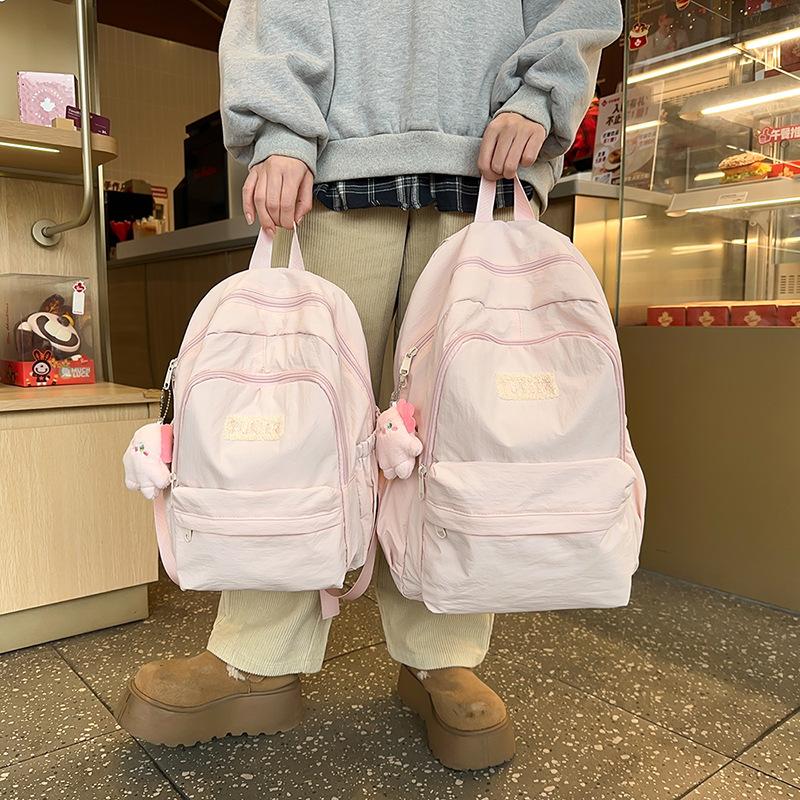 Frühling Neu Nylon Leicht Niedlich Einfarbig Buchstaben Lässig Große Kapazität Rucksack für Mittelschüler