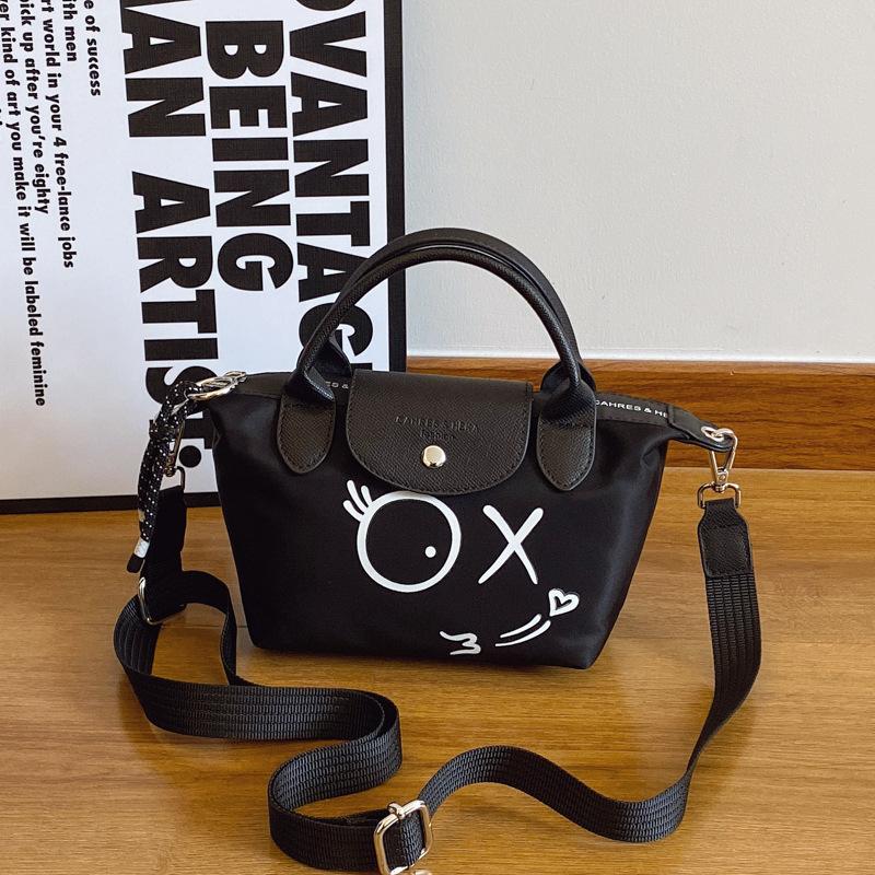 Large capacity bag women's new high-end sense niche portable shoulder bag fashion messenger tote bag tide