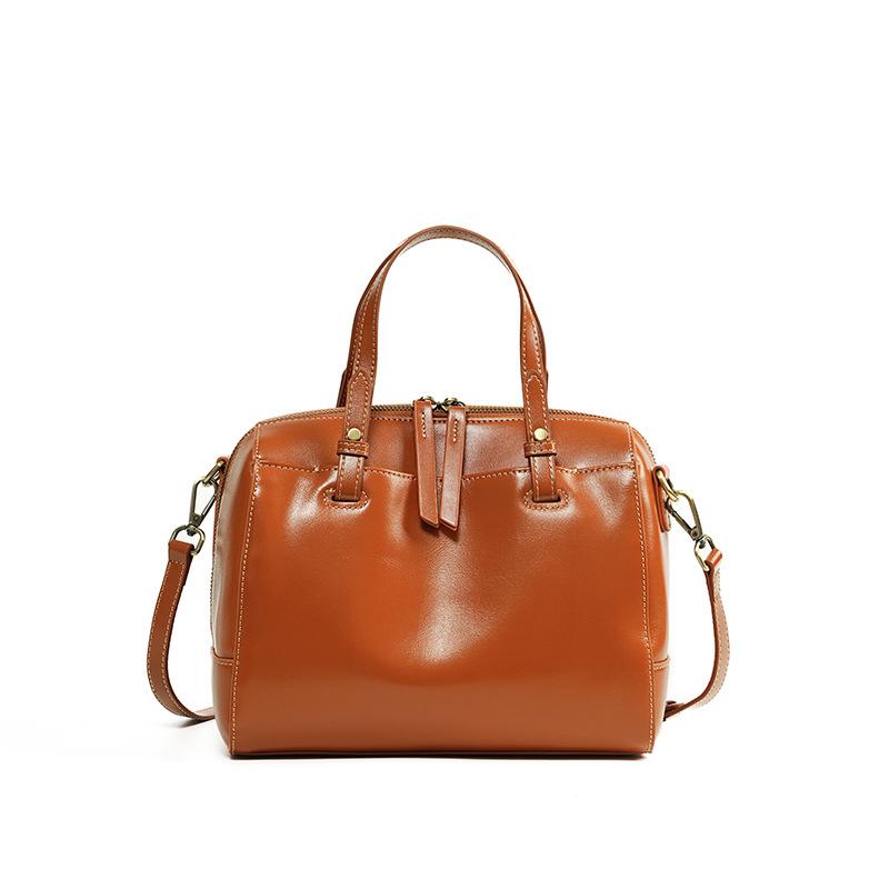 Vintage first-layer vegetable tanned cowhide commuter versatile handbag, genuine leather large-capacity bowling bag