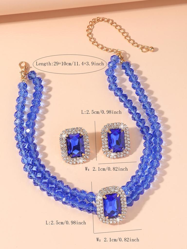 Luxuriöse doppellagige geometrische Kristallkette und rechteckiges Ohrstecker-Set