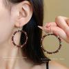 High-End Ethnic Teardrop Tassel Earrings with Cutout Design – Luxury Trend Jewelry