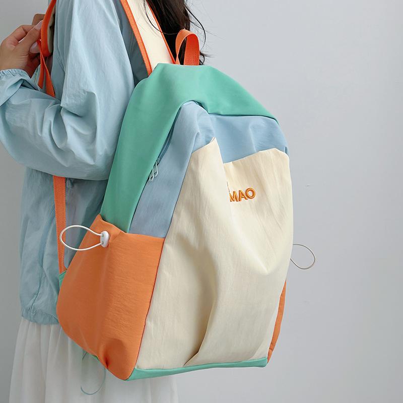 Casual backpack junior high school female student schoolbag ins large capacity couple travel backpack high value contrasting color backpack