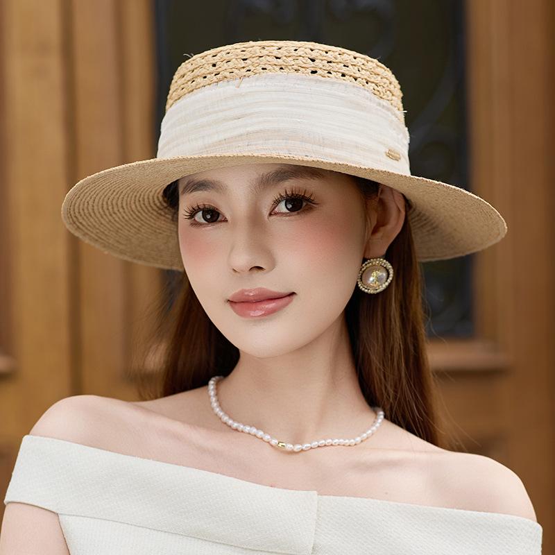 Hollow raffia flat top summer high-end travel seaside sunshade breathable straw hat sunshade French straw hat