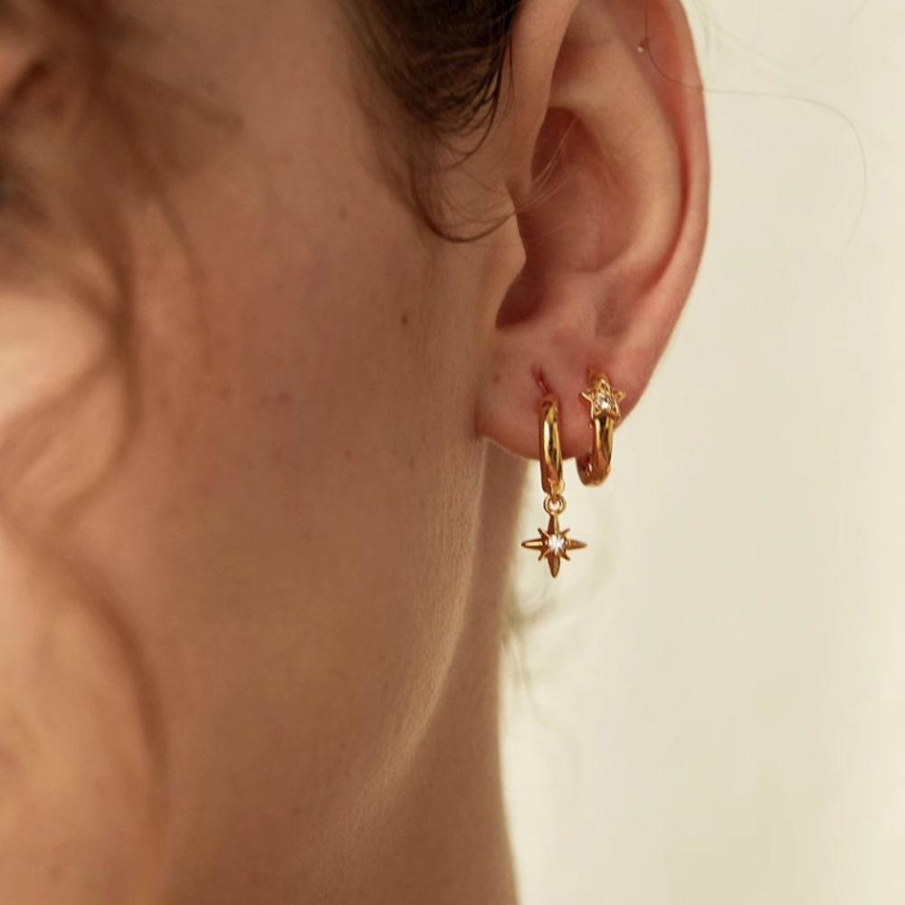 French gold asymmetrical octagram earrings, high-end light luxury, niche exquisite and simple stacked ear buckle earrings.