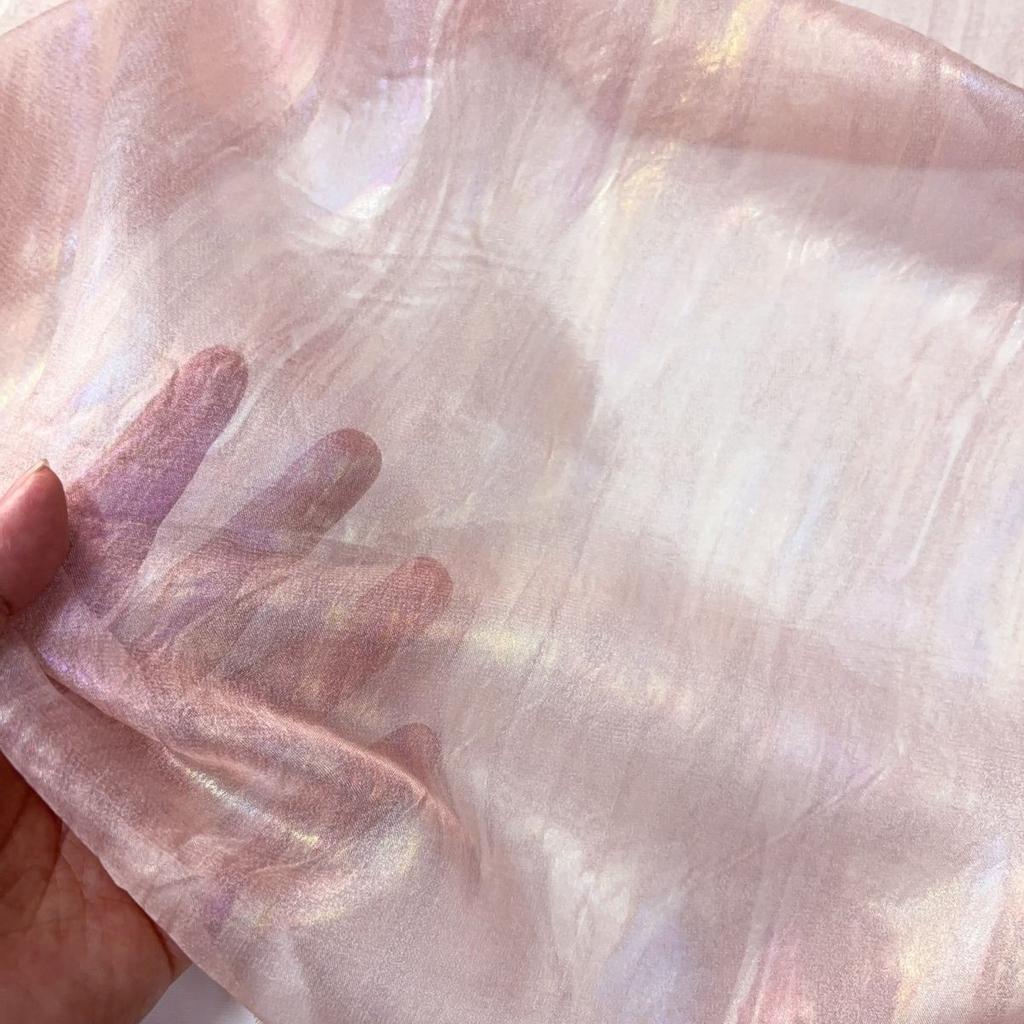 Drapeable semi-transparent pink lustrous gold-textured fabric suitable for wedding dresses formal gown designer clothing fabrics
